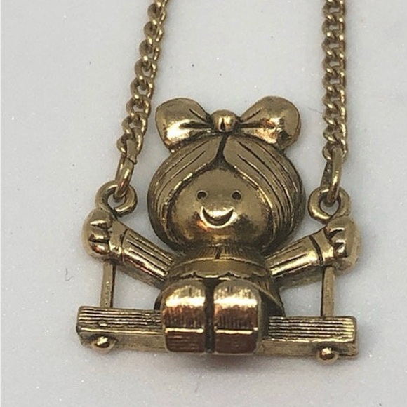 Avon Other - Vintage 1970s Avon Gold-Tone Swing Sweetly Girl on Swing Pendant Necklace